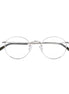 Round eyeglasses with black accents on a white background