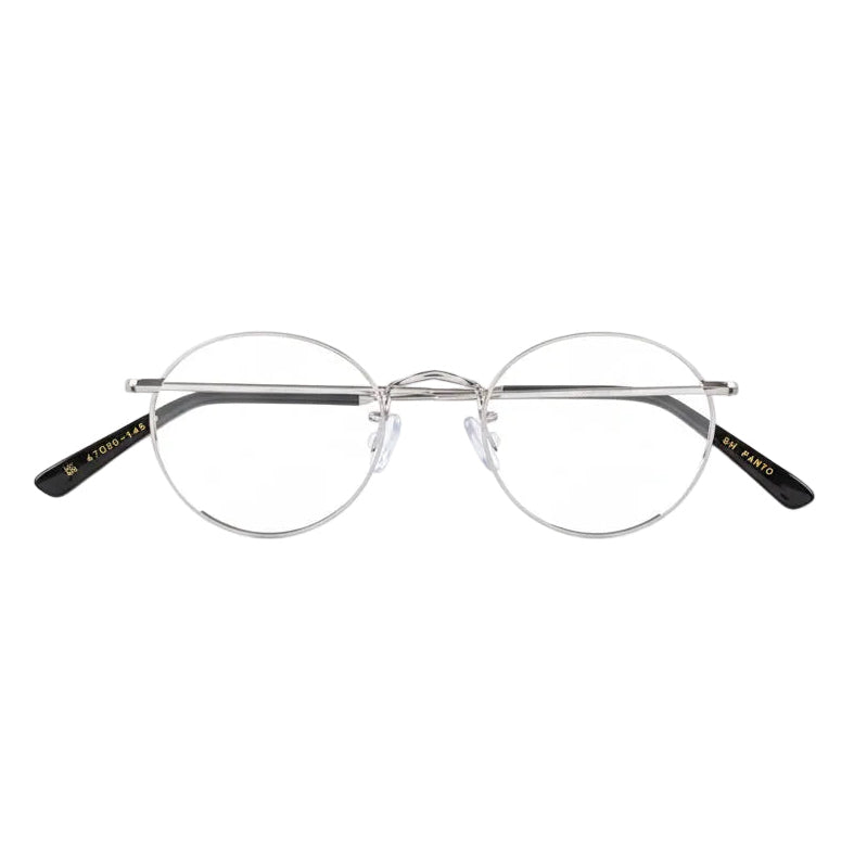 Round eyeglasses with black accents on a white background