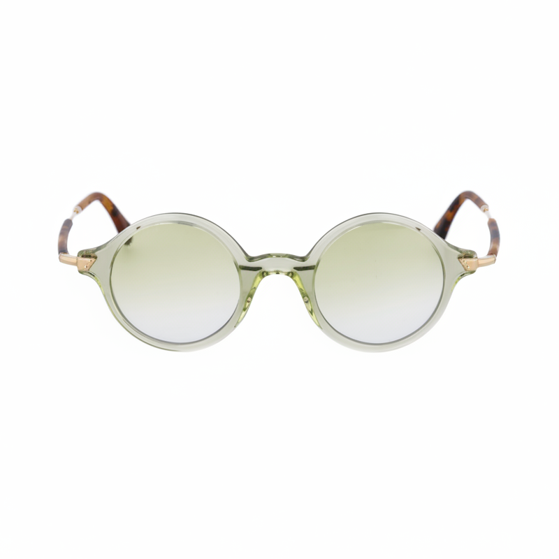 Round sunglasses with a greenish tint on a white background